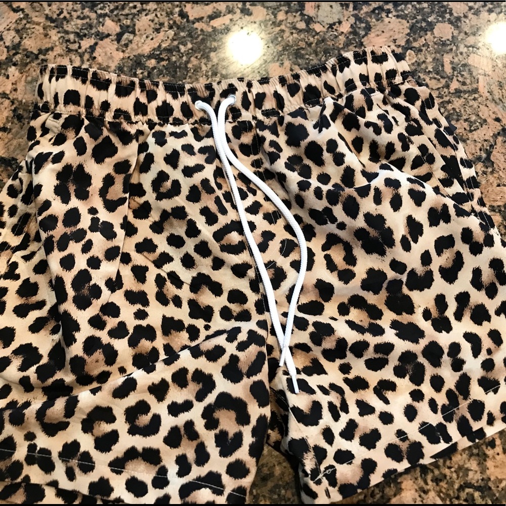 NWT Leopard Print Swim Trunks size medium.